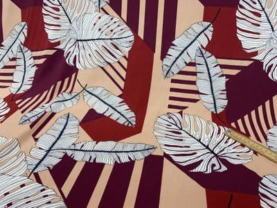 Viscose Dress Fabric - Monstera Leaves on Reds & Blush