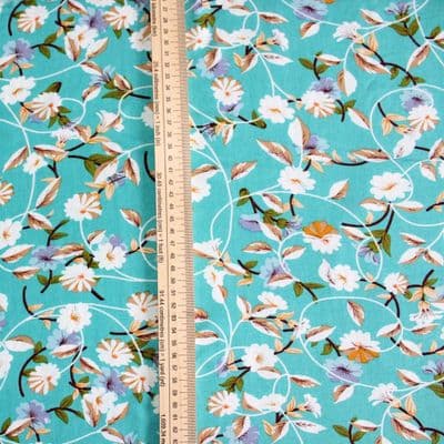 Viscose Dress Fabric  - Pale Flowers on Turquoise Blue