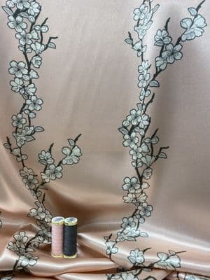 WHITE BLOSSOMS ON BABY PINK: Satin Dressmaking Polyester Fabric