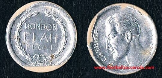 1934 Primo Carnera Elah Bon Bons boxing card in the style of a silver coin