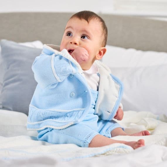 Blue knitted baby jacket
