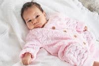 Pink basket weave knitted onesie