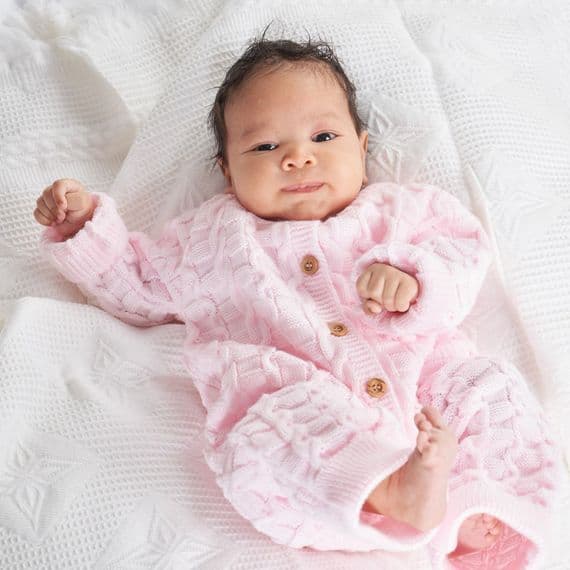 Pink basket weave knitted onesie