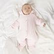 Pink cable knitted pramsuit