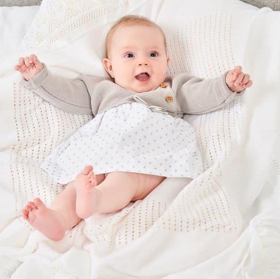 White knitted baby dress