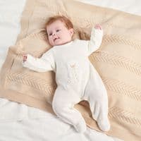 White rocking horse knitted onesie