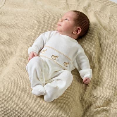 White rocking horse knitted onesie