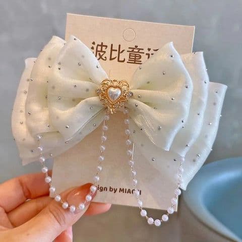 Milky White Pearl Bow Hair Clip £14.99
