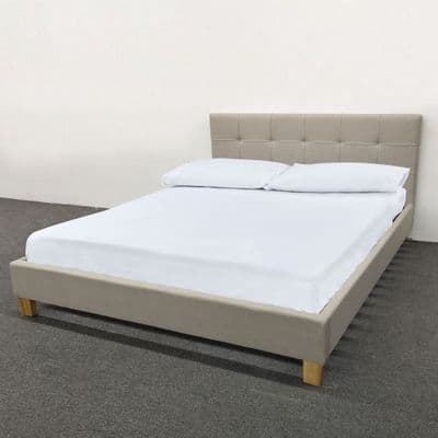 Double bed, Upholstered in Cream fabric- with Wooden feet