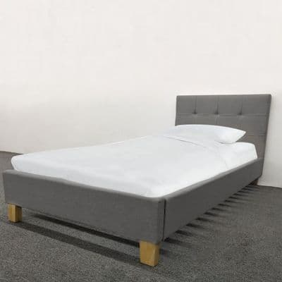Small Double bed, Upholstered in Grey fabric- with Wooden feet
