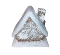 Christmas Forest illuminated Chalet House with a Snow Covered Roof