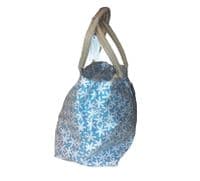 Daisies Pale Blue Wipe able Bag by Equilibrium