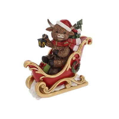 Large Christmas Highland Cow on a Sledge