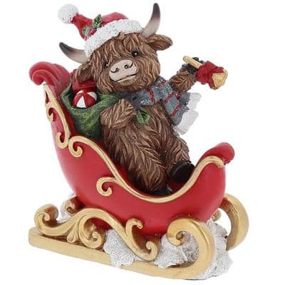 Small Christmas Highland Cow on a Sledge