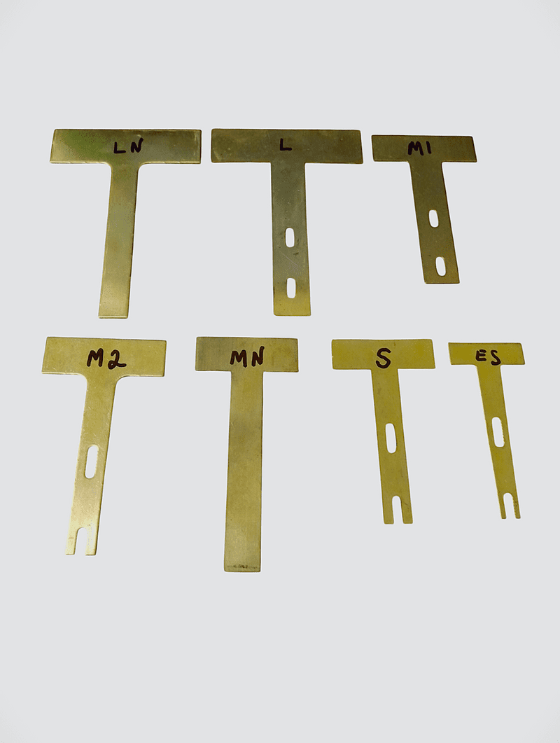 Brass frein blanks for use in making violin and cello pipes, Organ Building.