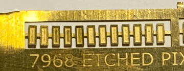 ULTOM040: V. Small rectangular details (recessed) (U4) Possibly detailing for Thompson Coaches. Price is for one strip of 12.