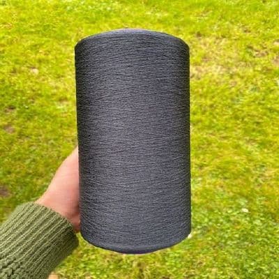 240/264 tram Black Souple Silk - 100g Cone