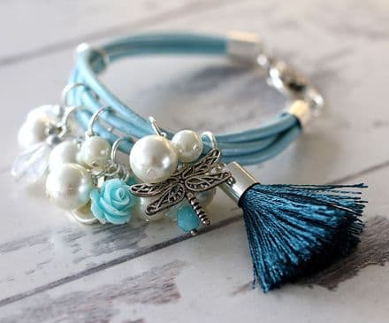 Blue leather charm bracelet with tassel