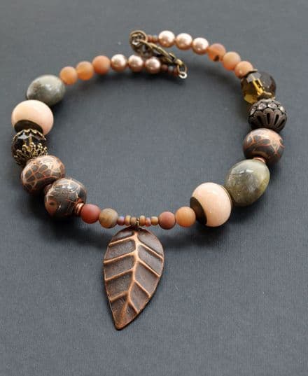 Chunky necklace with copper leaf pendant