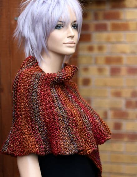 Knitted shawl with ruffled edge