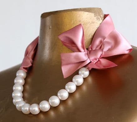 Pink pearl and ribbon necklace