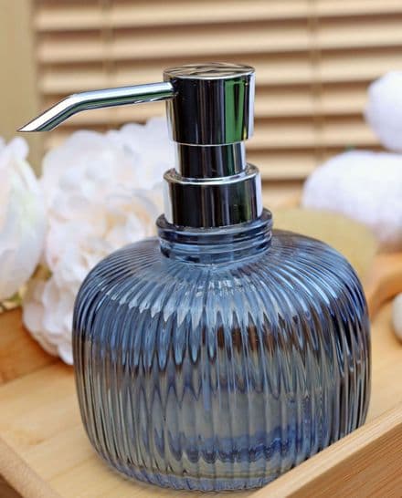 Vintage style glass soap dispenser in blue
