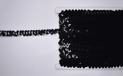 1 Row Stretch Sequin Trim.  12mm. 3 colours. 10 metres.