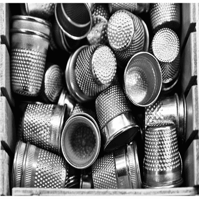 76375  Assorted Metal Thimbles.  Pack of 50