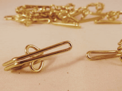 Loose Brass Pleated Curtain Hooks. 250 pieces approximately