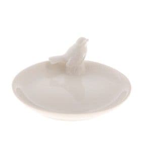 White ceramic trinket dish with bird.