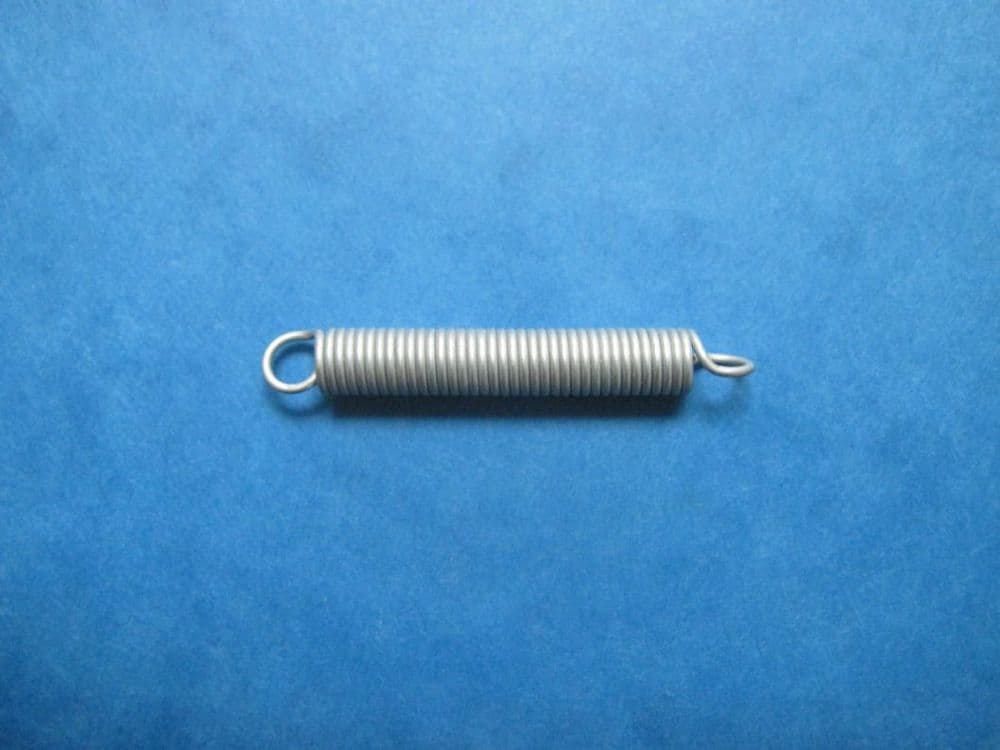 PLEATED BLIND TENSION SPRING