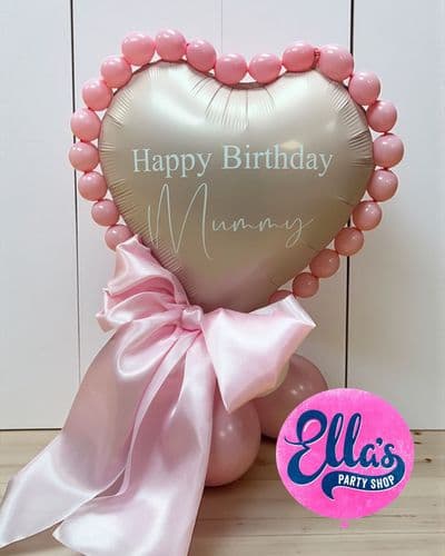 20" Beaded Foil Heart Balloon airfilled on a balloon base