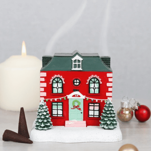 Christmas house incense cone burner.