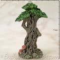 Enchanted Forest -  Green Tree Man Miniature - with scroll  on the left looking out.