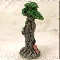 Enchanted Forest -  Green Tree Man Miniature - with scroll  on the left looking out.