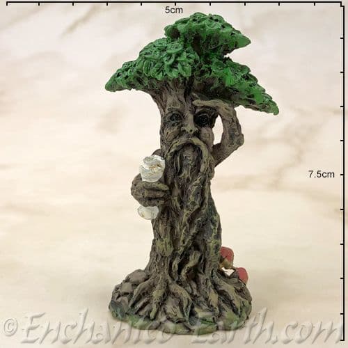 Enchanted Forest - Green Tree Man Miniature - with scroll on the left looking out.