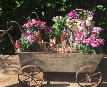 Fairy Cottage Garden in a Zinc Barrow planter.