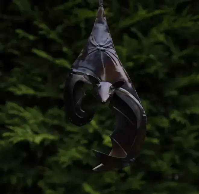 Hanging Bat with curved wing - made form 100% Recycled Metal -.