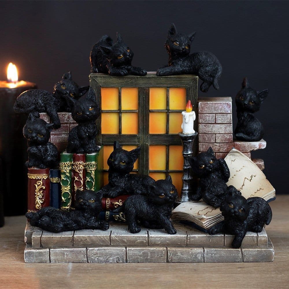 Miniature Black Cats.