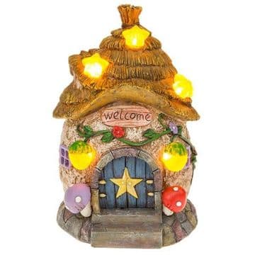 Solar - Light- up Thatched cottage with stars - Fairy Cottage - 14.5cm