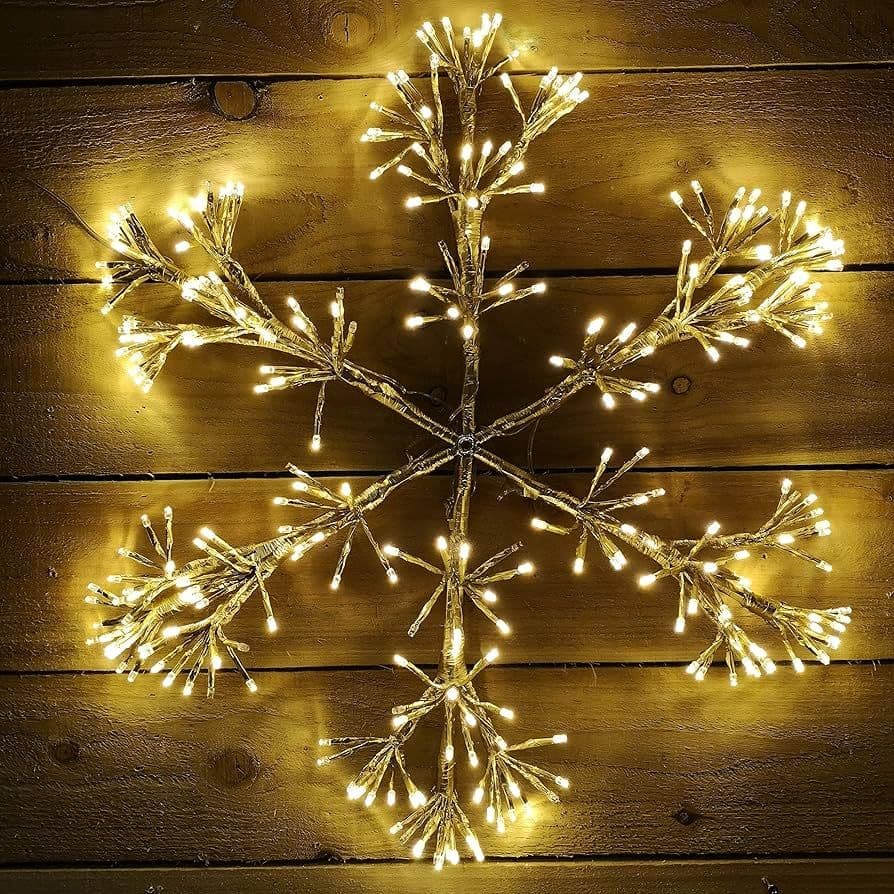 Twinkling - Gold Starburst Snowflake with 300 Warm White LED.