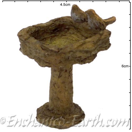 Woodland Knoll Stone Effect Bird Bath with two little birds.