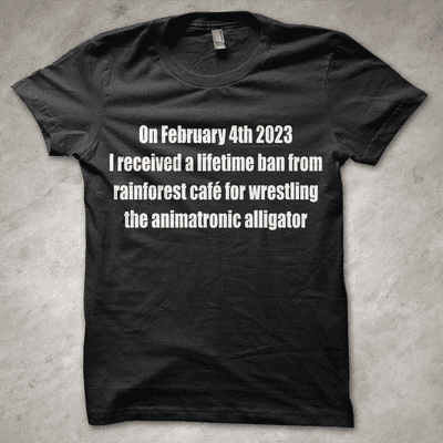 'Rainforest cafe lifetime ban' - Funny T-Shirt