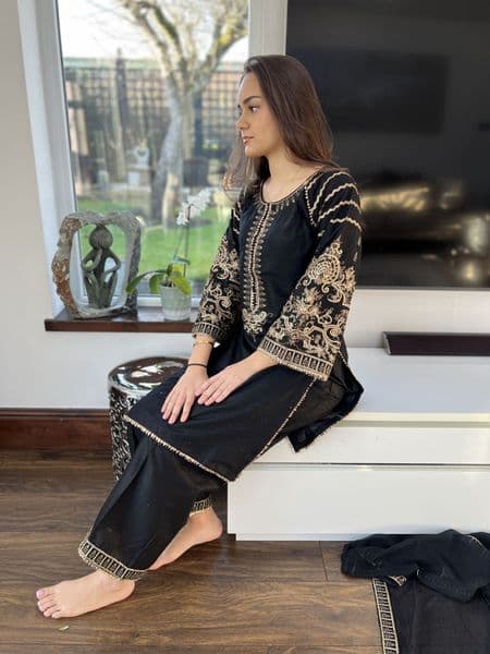 Hawa black and gold suit