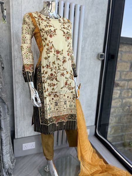 Safeera lemon lawn suit