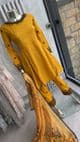 Yellow peplum style dress