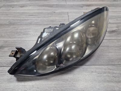 GENUINE FORD COUGAR PASSENGER LEFT HEADLIGHT CLUSTER 1998 - 2000