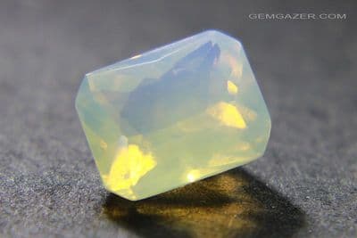 Adamooka Crystal Opal with blue sheen, faceted, Australia. 3.24 carats.  (Video)