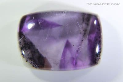 Amethyst cabochon with Goethite phantom, zoning, Brazil. 21.71 carats.