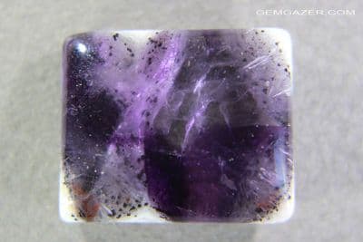 Amethyst cabochon with Goethite phantom, zoning, Brazil. 26.50 carats.